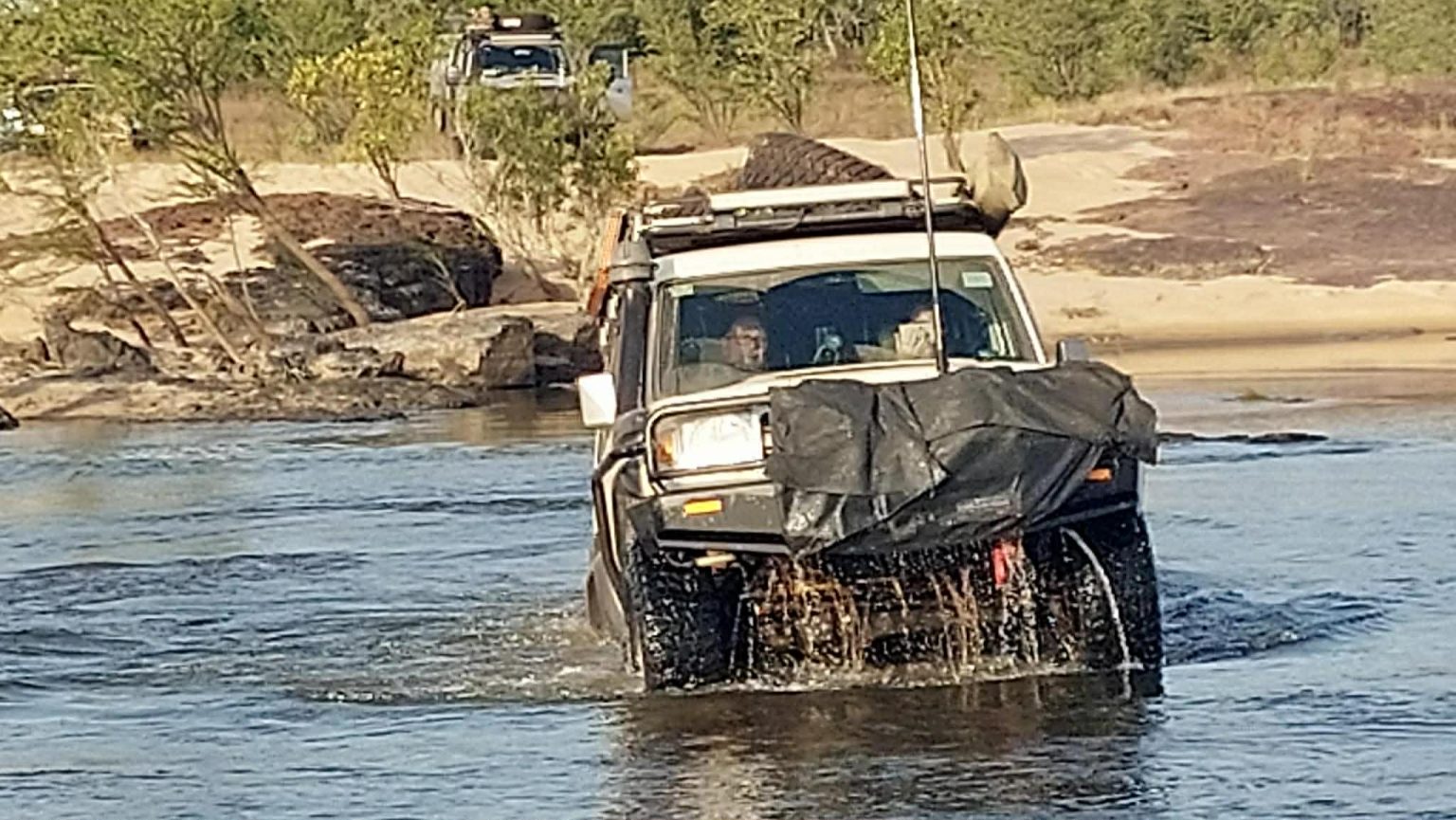 4x4 fording a river crossing in the Kimberley, Western Australia