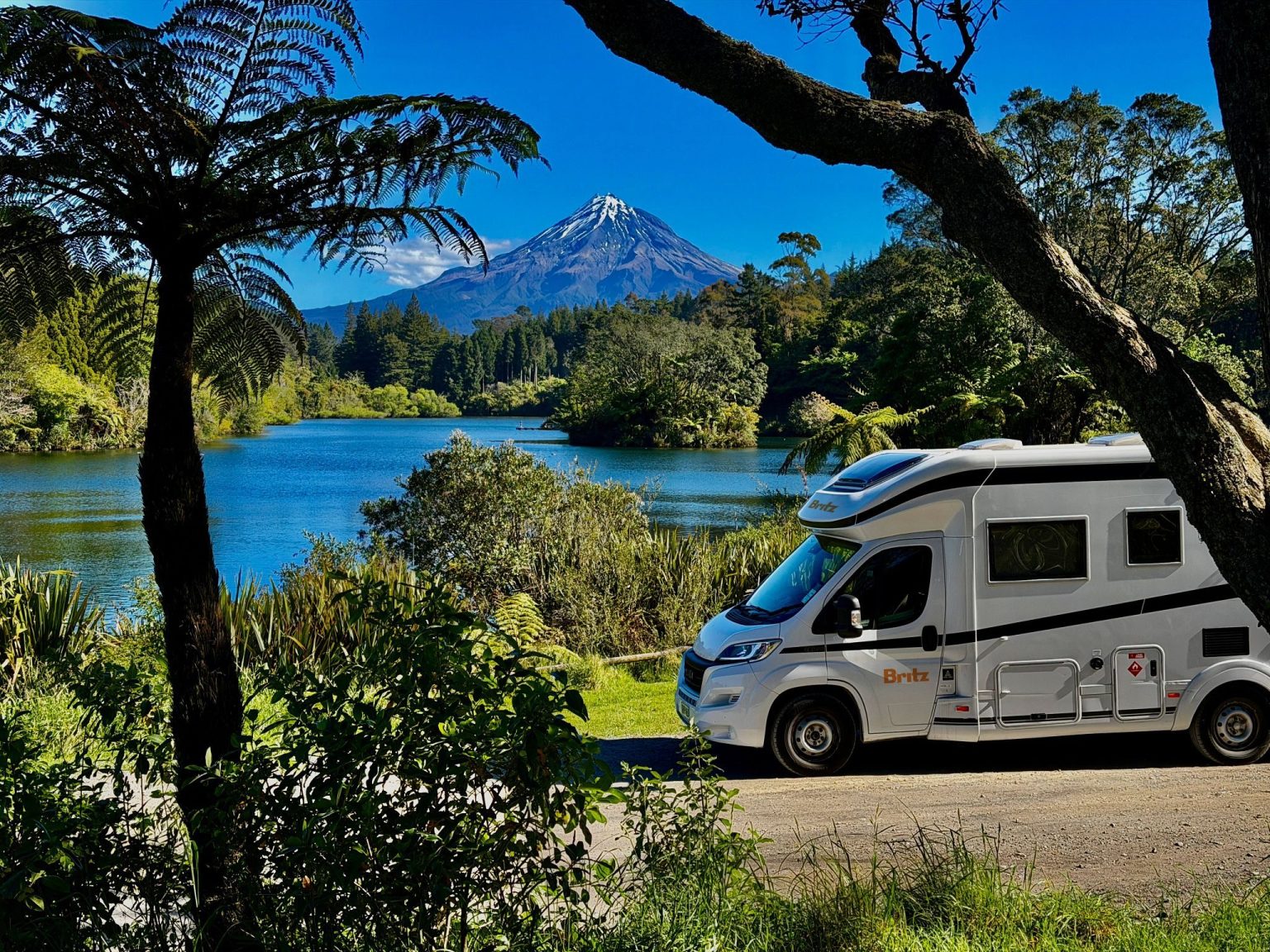 A Britz Wanderer campervan at Lake Mangamahoe, Taranaki, North Island, New Zealand