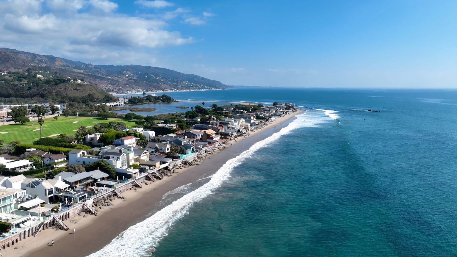 Aerial view of beach houses along the Malibu shoreline