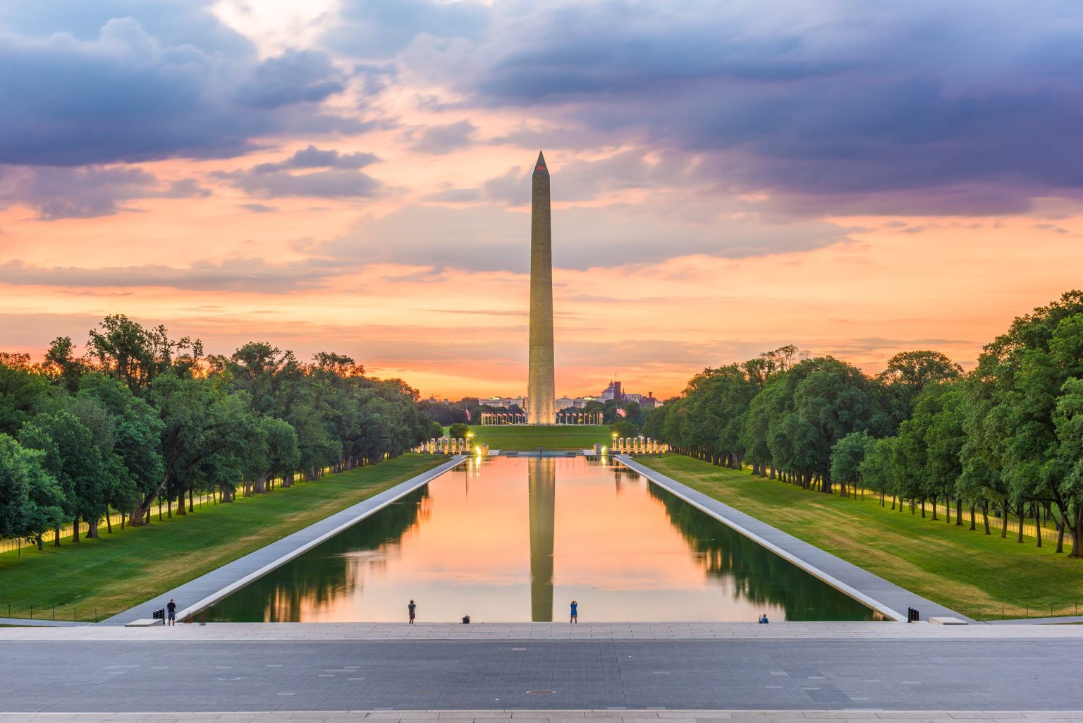 Washington Monument mirrored in the Reflecting Pool at sunrise, Washington DC