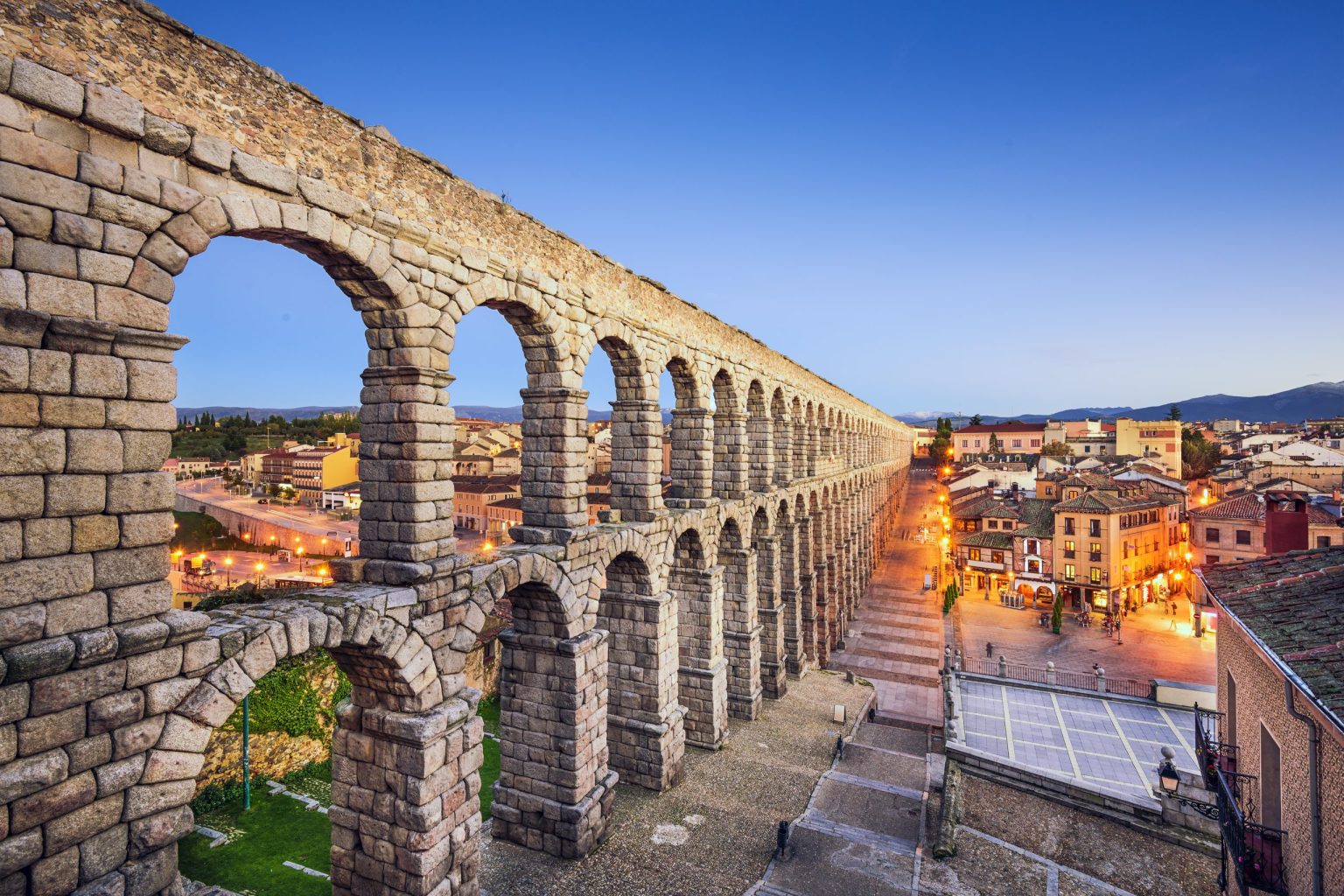 The Roman aqueduct of Segovia at dusk