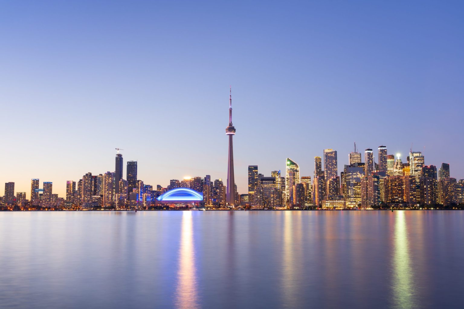 Toronto skyline on Lake Ontario at dusk