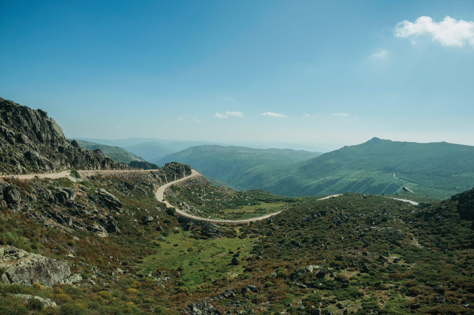 Mountain road through granite boulders in the Serra da Estrela
