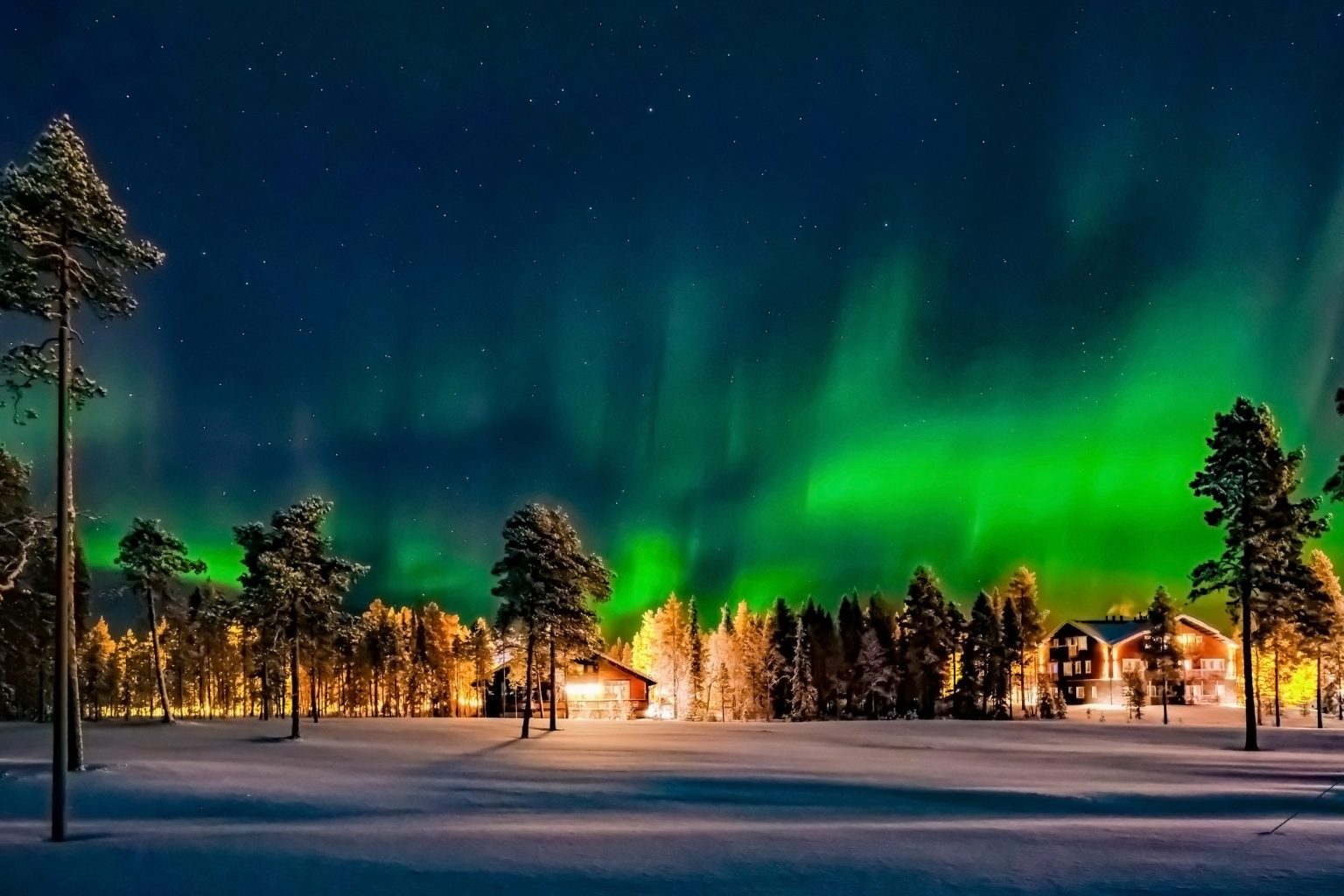 The northern lights over Lapland in winter