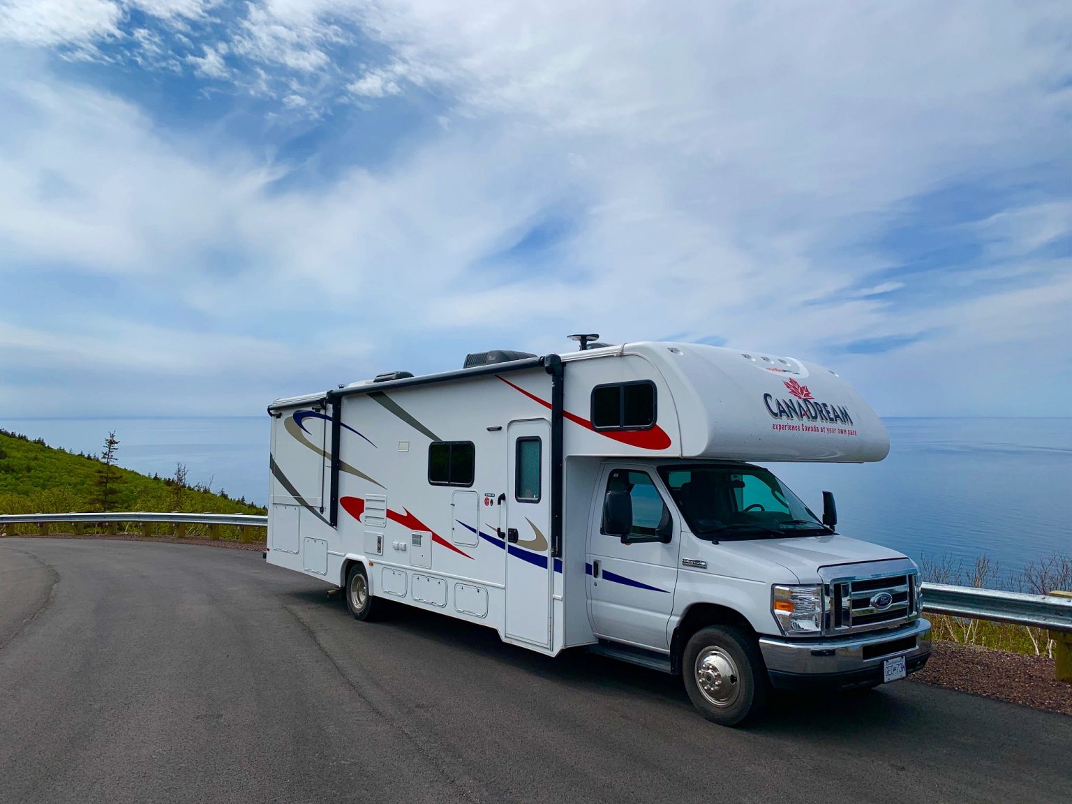 Motorhome on a coastal road above the sea, Nova Scotia, Canada