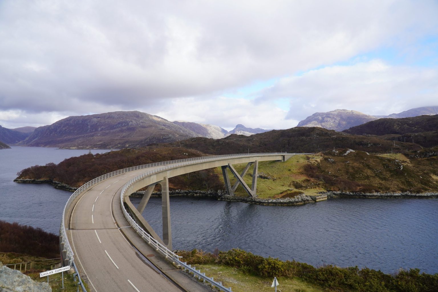 Kylesku Bridge curving over the sea lochs of Sutherland