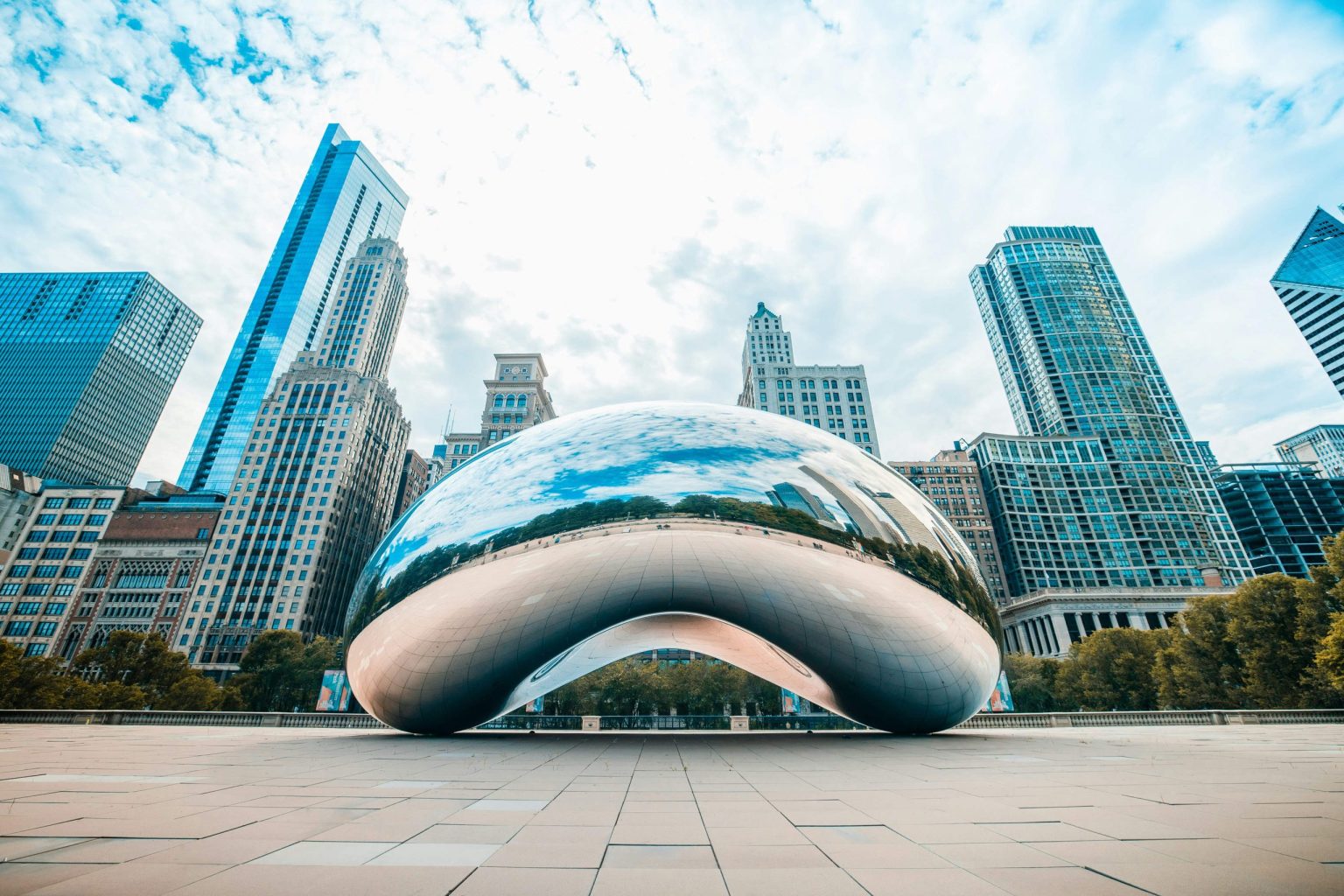 Cloud Gate sculpture and skyscrapers in Chicago's Millennium Park