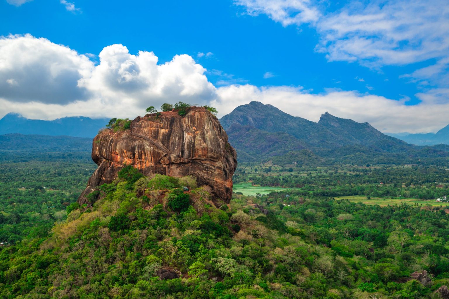 Sigiriya Lion Rock fortress rising above the jungle in Sri Lanka's cultural triangle