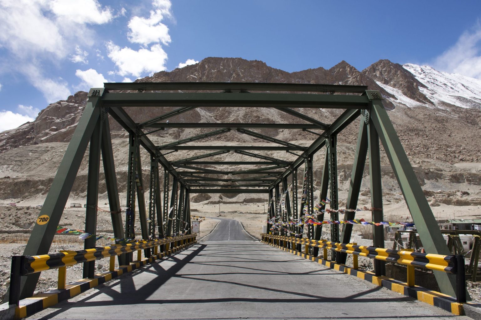 Steel bridge on a mountain road in Ladakh