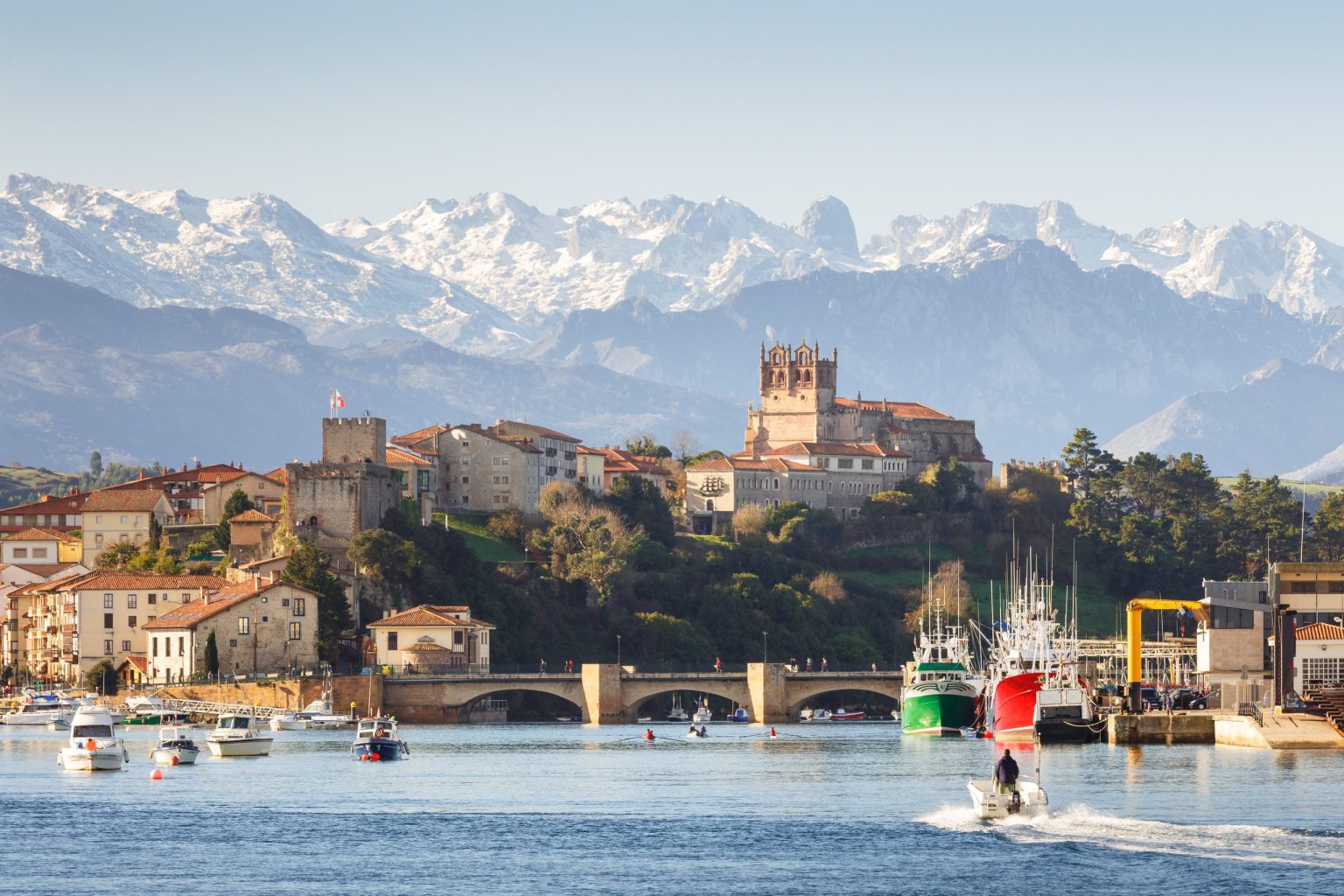 San Vicente de la Barquera harbour beneath the snowy Picos de Europa