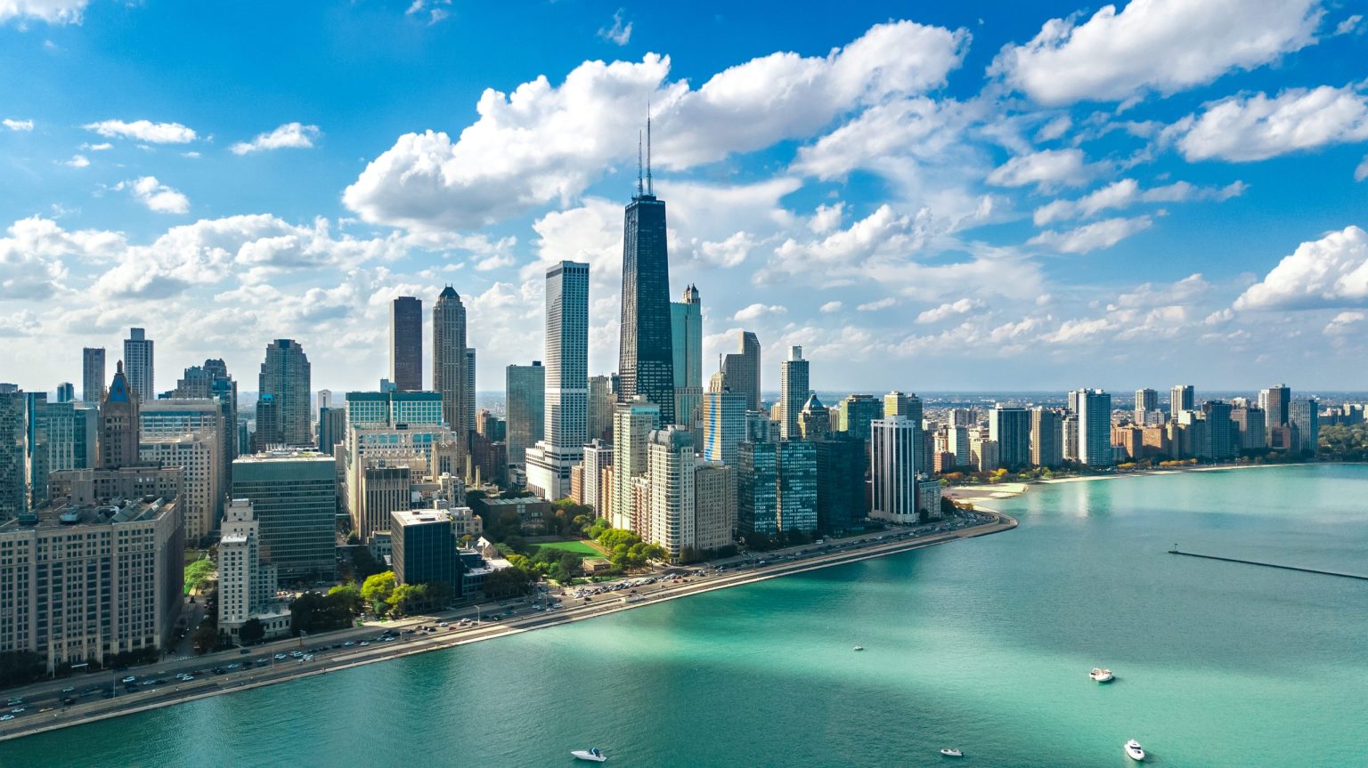 Chicago skyline above Lake Shore Drive and Lake Michigan