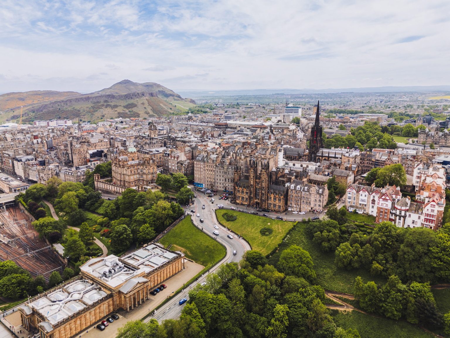 Aerial view of Edinburgh's Old Town with Arthur's Seat beyond