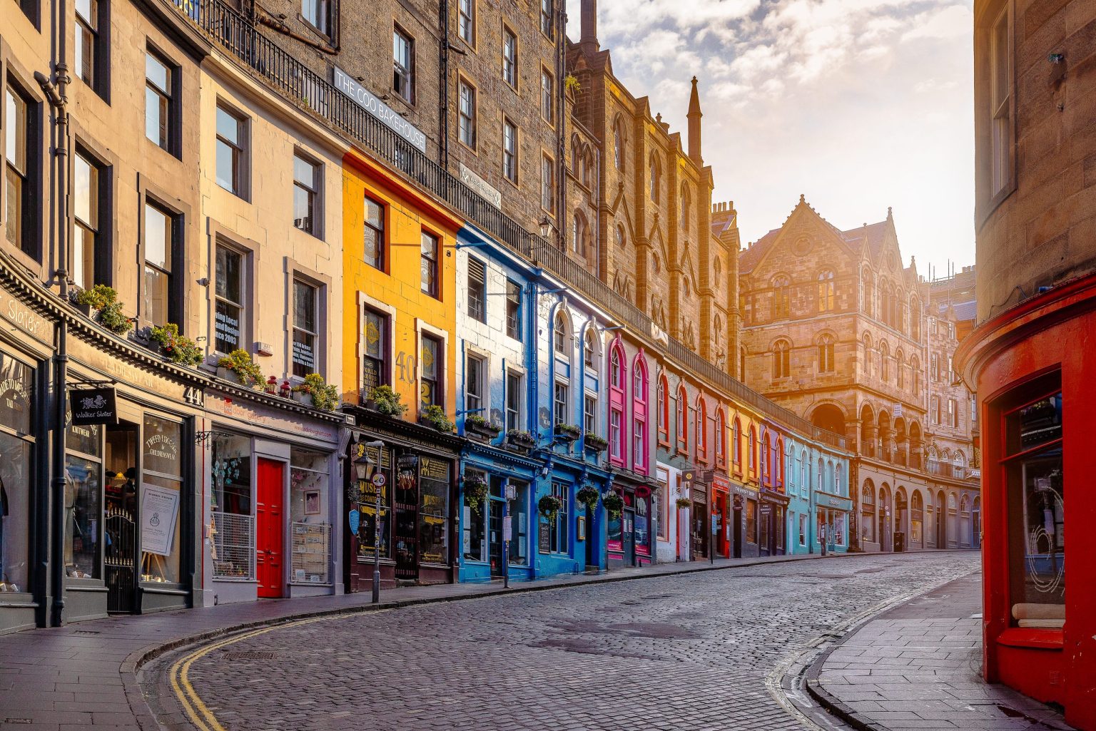 Colourful shopfronts on Victoria Street in Edinburgh's Old Town