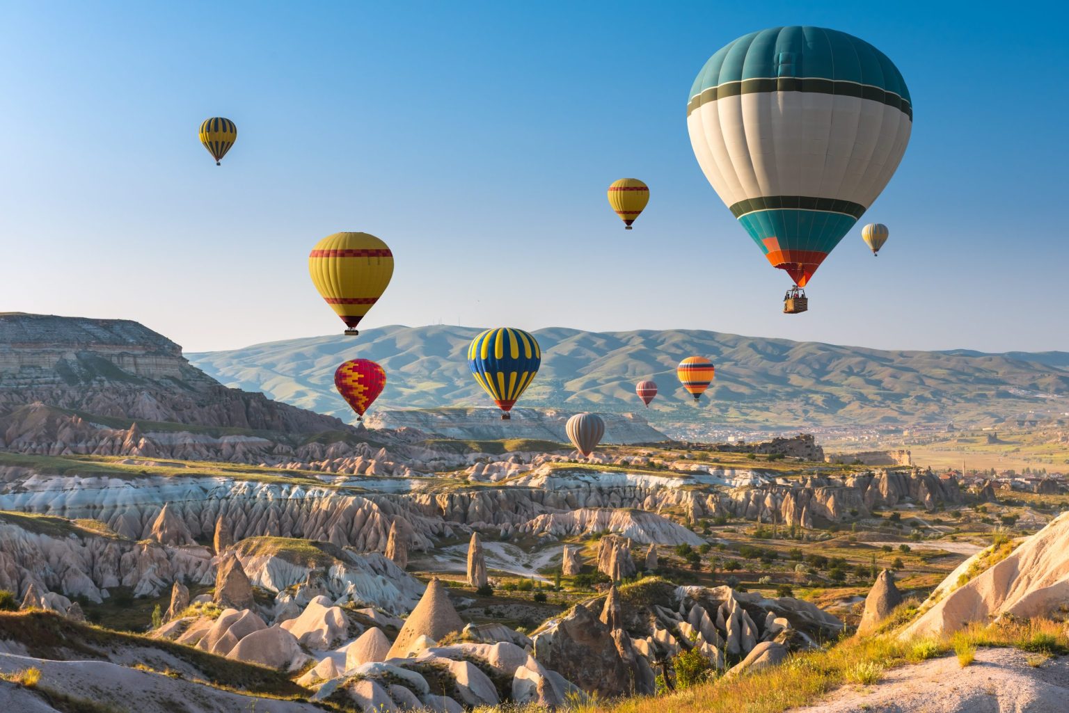 Hot-air balloons over the fairy chimneys of Cappadocia, Turkey