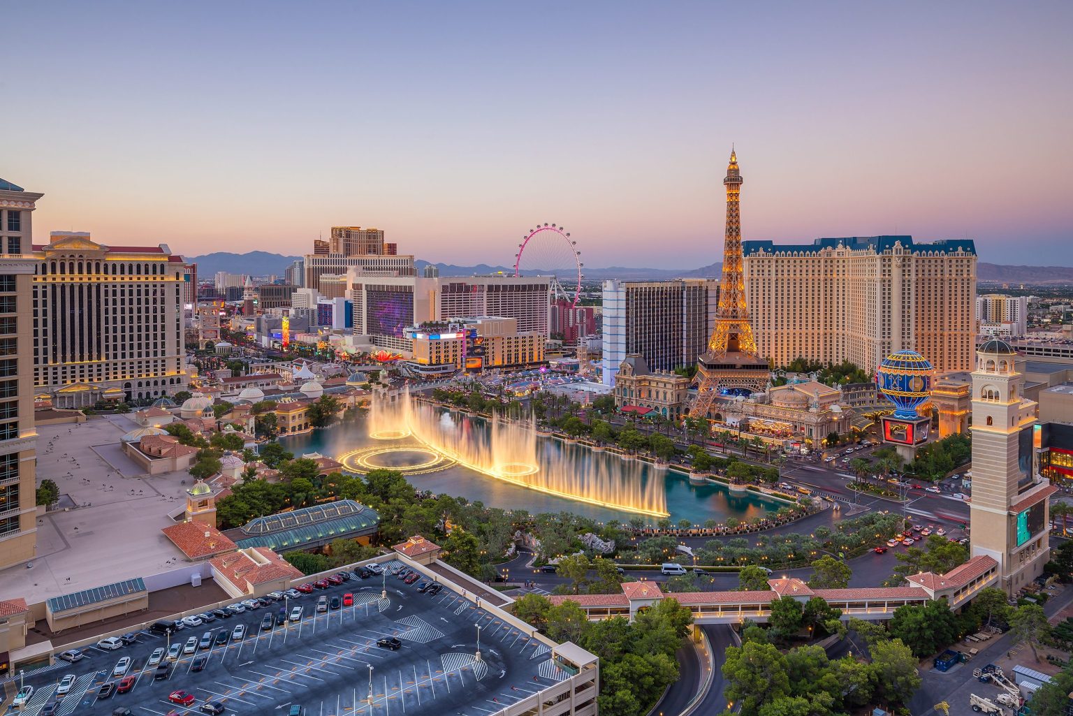 The Las Vegas Strip and Bellagio fountains at dusk